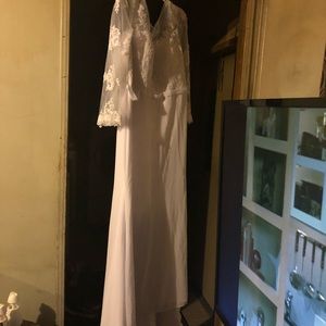 White lace evening gown with sheer sleeves